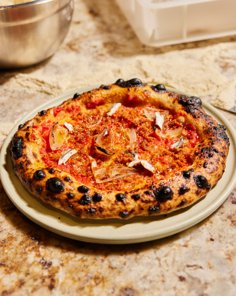 Walrus Rodeo signature dishes Anchovy and Butter Pizza, Rodeo Za, Peaches and Burrata.